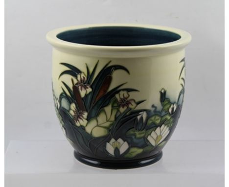 A MOORCROFT PLANTER, tube lined and painted waterlily and bulrush decoration, impressed and painted factory marks to base, 17