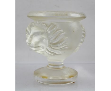 A LALIQUE CRYSTAL GLASS "TETE DE LION" CIGARETTE HOLDER, no.10567, on circular platform foot, signed "Lalique, France", 9cm h