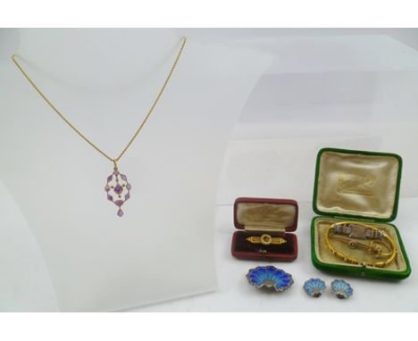 A SELECTION OF JEWELLERY comprising; a sterling silver and blue enamel scallop brooch and matching earrings, a seed pearl set