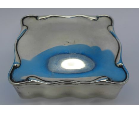 A silver ring and jewellery box with fitted interior, hallmark worn, width 9cm