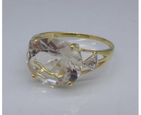 A 9ct gold, white topaz and diamond ring, 1.8g, O
