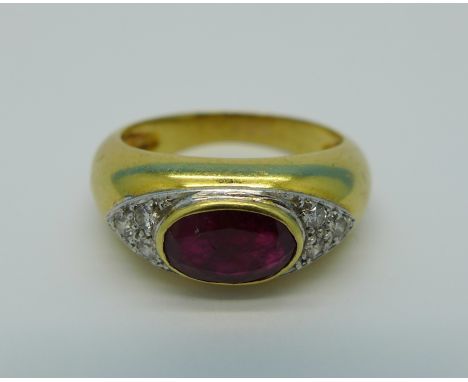 A yellow metal, diamond and ruby signet ring, 5.9g, M