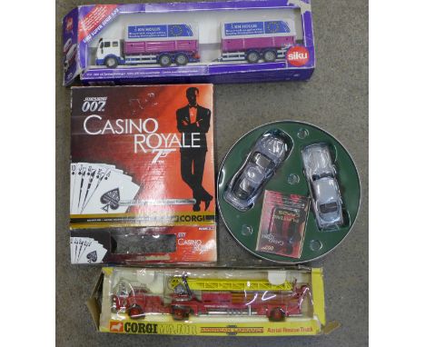 A Corgi Major Aerial Rescue Truck, a Siku Lorry with trailer and a James Bond 007 Casino Royale vehicle box set, all boxed, b