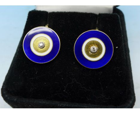 A pair of gold, diamond and enamel screw back earrings, made from two gentleman's buttons, studs or cufflinks