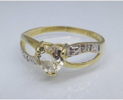 A 9ct gold, topaz and diamond ring, 1.1g, O
