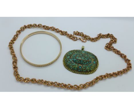 A plated bangle, a chain and a pendant