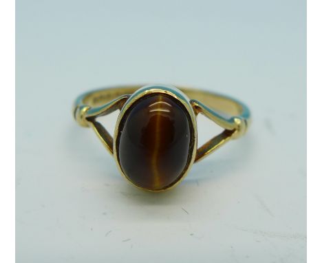 A 1970's 9ct gold and tigers eye ring, Birmingham 1979, 1.8g, K