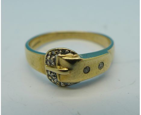 A 9ct gold and diamond buckle ring, 2.2g, N