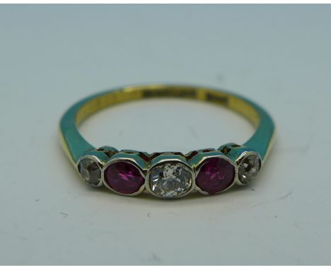 An 18ct gold, diamond and ruby ring, 2.3g, M