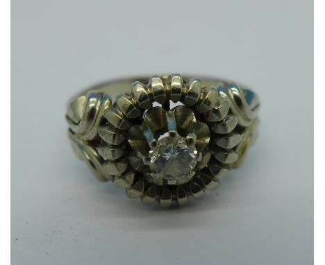 A white metal and diamond ring, continental control mark, 4g, M, 0.25 carat diamond weight