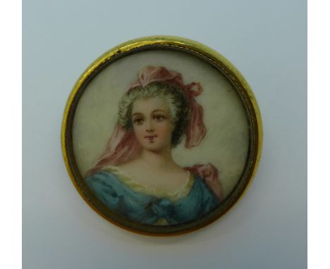 A miniature portrait brooch in a yellow metal frame, 27mm