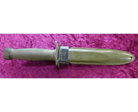 A US M8A1 dagger with scabbard