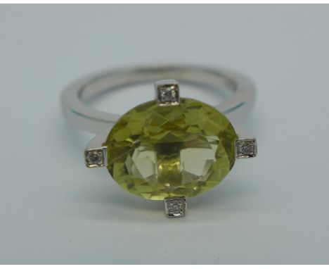 An 18ct white gold, citrine and diamond ring, 5.8g, O