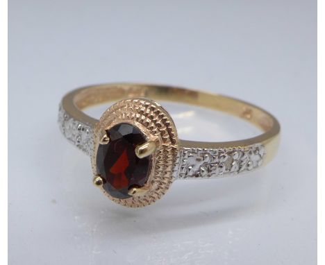 A 9ct gold, garnet and diamond ring, 1.3g, O