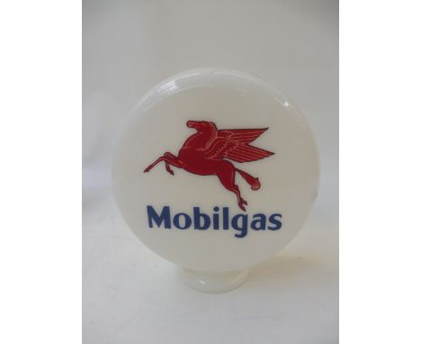 A reproduction Mobilgas oil pump glass globe.