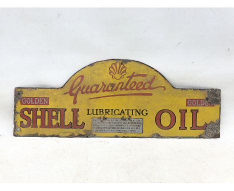 A Shell Lubricating Oil 'Golden' enamel cabinet pediment sign, 25 x 9".