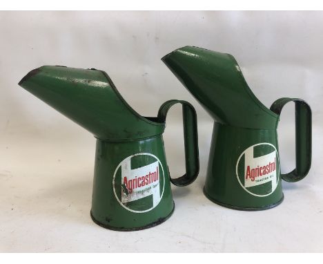 Two Agricastrol Tractor Oil pint oil measures, one in good condition. 