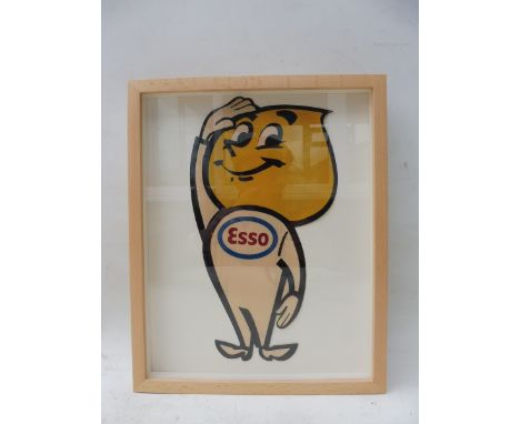 An original 1960s celluloid Esso advertising figure, in a contemporary frame,10 x 12 1/2".