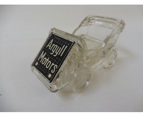 A rare Argyll Motors miniature glass model car.