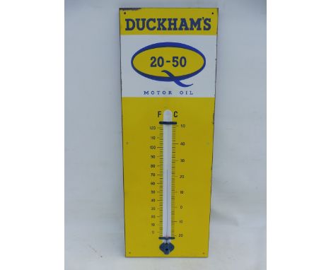 A Duckham's 20-50 enamel thermometer, 13 x 36".