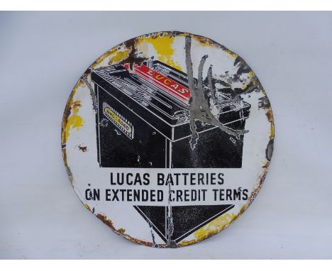 A Lucas Batteries pictorial circular enamel sign.