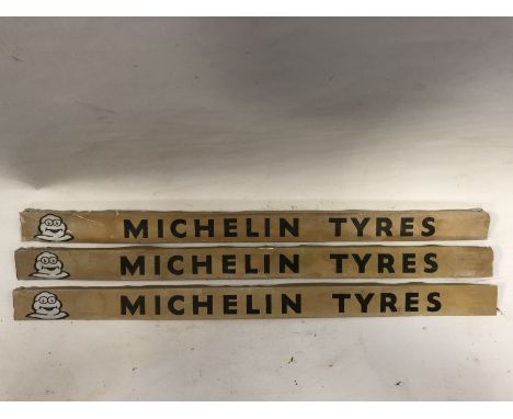 Three Michelin Tyres shelf strips. 