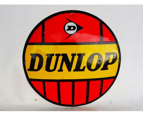A Continental Dunlop convex enamel sign with some retouching, 19" diameter.