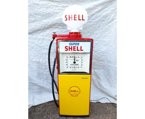 A late 1950s Beckmeter Model M50 'clock face' petrol pump, professionally restored to a high standard in its correct period S
