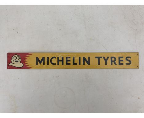 A Michelin Tyres rectangular shelf strip of large size, 19 x 2 1/2". 