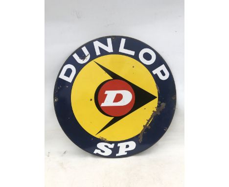 A Dunlop SP circular double sided enamel sign, 27 1/2" diameter.