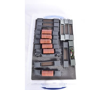 Mainline 00 Gauge bogie Well Wagons some with boiler loads, twelve dark grey wagons, six with Boiler load, four light grey, o