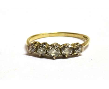 AN OLD CUT DIAMOND FIVE STONE DRESS RING The graduated diamonds measuring approx. central 0.4 cm, 2 at 0.3 cm, 2 at 0.2 cm, T