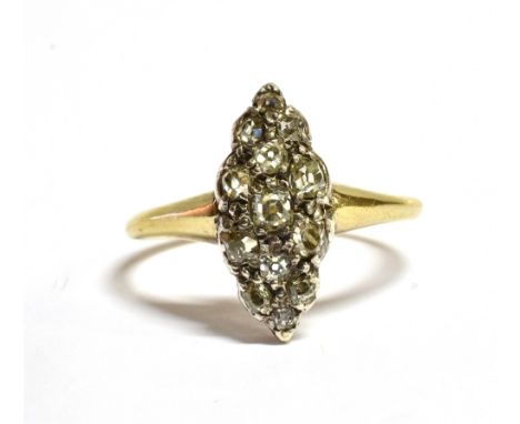 A VICTORIAN 18CT GOLD DIAMOND NAVETTE RING THE Navette set with 13 old cut diamonds in various sizes, the plaque measuring 1.