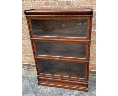 A THREE TIER OAK GLOBE WERNICKE SECTIONAL BOOKCASE  with drawer to base, 87vm wide 31cm deep 124cm high Condition Report : go