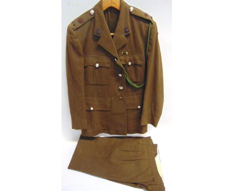 MILITARIA - ASSORTED BRITISH UNIFORM  comprising a khaki jacket and trousers, with outfitters label for Major R. Jury, Devons