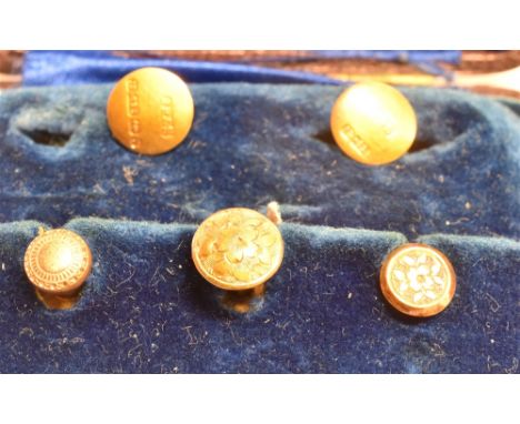 A CASED COLLECTION OF FIVE SHIRT STUDS FOUR MARKED 15CT 625 Birmingham maker J R &amp; S, date letters vary and one un marked