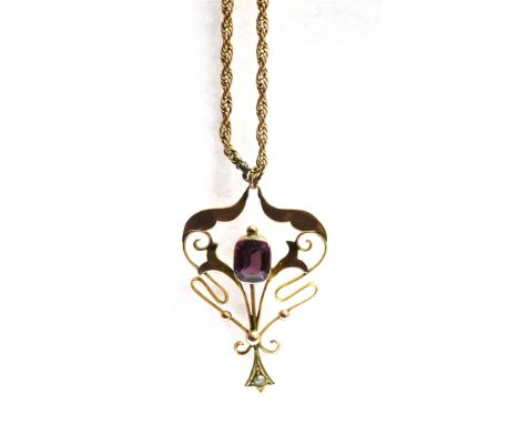 A MARKED 9CT ART NOUVEAU PENDANT PIECE  With chain the pendant is set with a purple faceted garnet and one tiny seed pearl, t