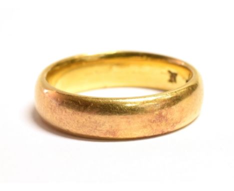 A 22CT GOLD BAND RING ring size N, weight 7.3grams, faded Birmingham markings to the shank