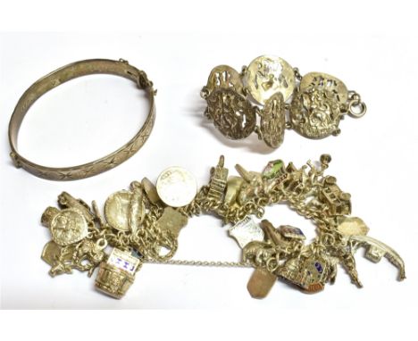 THREE SILVER/WHITE METAL BRACELETS the bracelets comprising a silver and white metal 800 charm bracelet, weight 86.2grams, a 