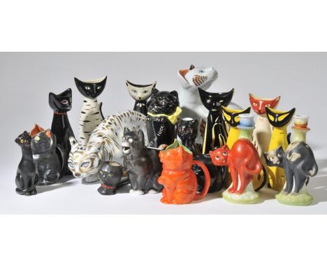 *Pottery cats. A collection of pottery cats including 1960s jugs modelled as seated cats,  various colours and sizes includin
