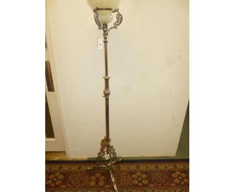 *Lamp. An Edwardian electroplated standard lamp,  with telescopic action and pierced rococo style mounts, 158.5cm high, with 