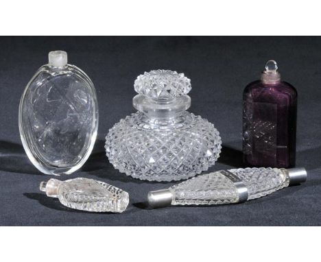 *Scent bottles. A Georgian double-ended scent bottle,  with diamond cut body, white metal mounts and presentation inscription