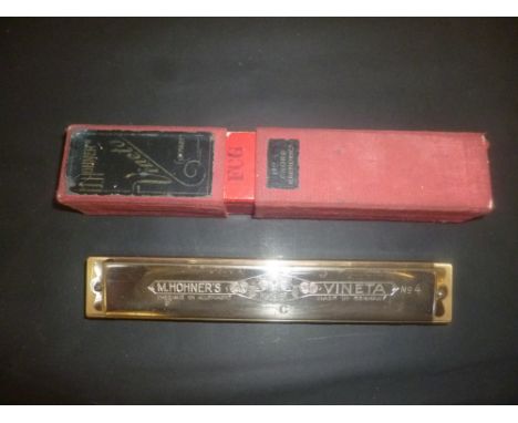 *M. Hohner's Vineta No. 4 Chord Harmonica, 'F', 'C' and 'G', made in Germany, circa 1910,  housed in its original cloth-cover
