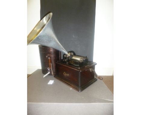 *An Edison Standard Phonograph, with serial number 689100C,  in a stained oak case with black enamel and gilt finish, and a r