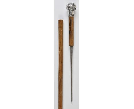 *Walking cane. A late 19th-century French swordstick,  with white metal knop embossed with flowers on a bamboo shaft with con