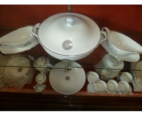 *Limoges. An 84 piece porcelain dinner and coffee service by Royal Limoges,  decorated in the 'Platinum Rosace' pattern, comp