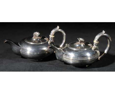 *Teapot. A pair of George III silver teapots by John Cope Folkland, London 1821,  of squat form with stylised flower head fin