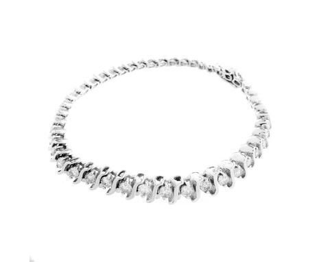 Vintage Approx. 1.60 Carat Round Brilliant Cut Diamond and 14 Karat White Gold Tennis Bracelet. Diamonds J-K color, SI1-I1 cl