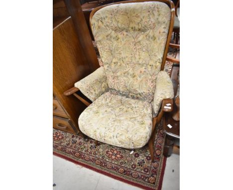 A vintage Ercol wingback armchair