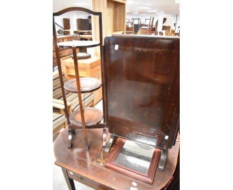 An early 20th Century oak cake stand, a vintage metamorphic firescreen (converts to tea or card table) and a modern wall mirr